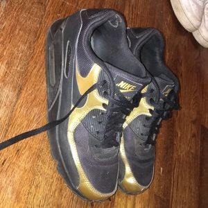 Nike gold and black air max